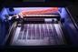 Гравировка и автомат для резки лазера СО2 Engraver лазера настольного компьютера для высекать главу и художнические работы поставщик